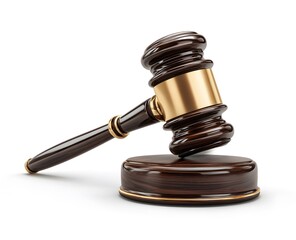 A polished wooden gavel with a golden band and handle resting on a matching wooden sound block, symbolizing authority and justice in legal proceedings.