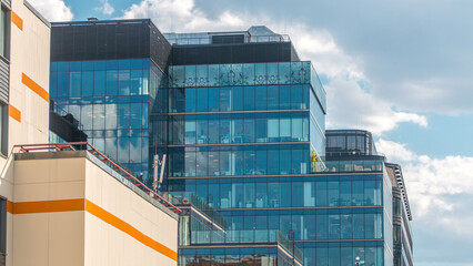 Fototapeta premium Windows in office buildings in Tverskaya Zastava near Temple of St. Nicholas timelapse in Moscow, Russia