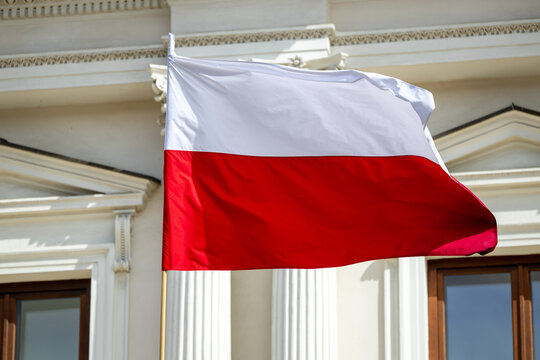 Polish national flag in Warsaw – patriotism and street scenes