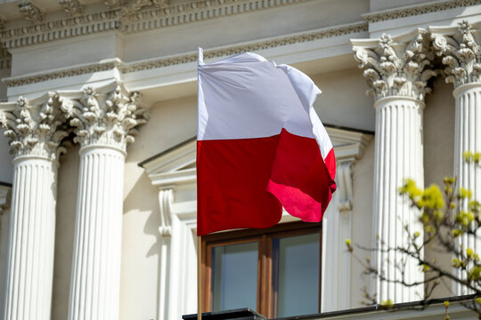 Polish national flag in Warsaw – patriotism and street scenes