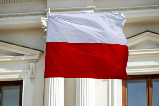 Polish national flag in Warsaw – patriotism and street scenes