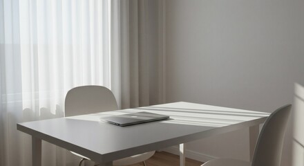 Minimalist workspace setup with a laptop on a white table, bathed in natural light from sheer curtains, creating a serene atmosphere.