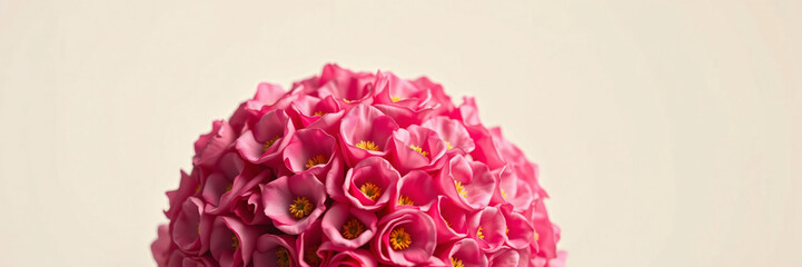 Spherical Pink Floral Arrangement on Neutral Background
