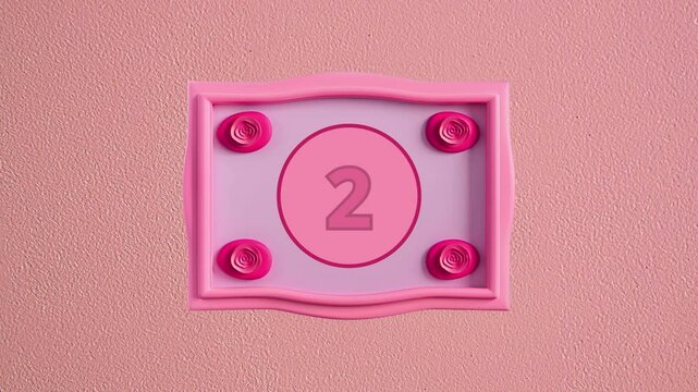 Number 2 Two Displayed On Pink Circle Inside Pink Design Rectangular Box Against Soft Pink Background	