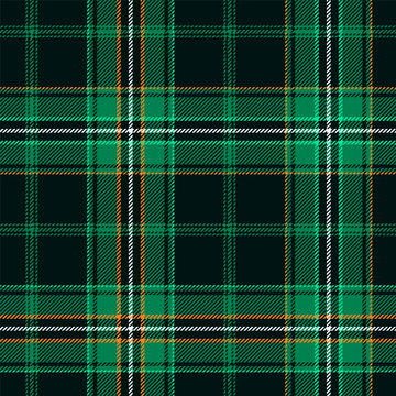 Classic tartan, plaid seamless pattern with green, white and orange
