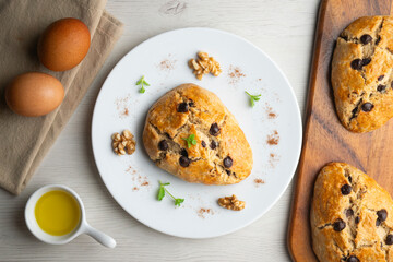 Triangular English scones with dark chocolate chips.