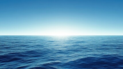Obraz premium Aerial view of a smooth ocean gradient, blending aqua tones into royal blue as sunlight reflects off the water