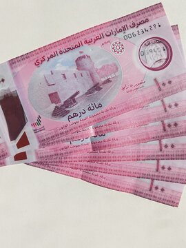 Currency notes, UAE Emirates currency 100Aed, Dirhams, Closeup of UAE Hundred dirhams currency notes, paper money 100 Aed dirhams. Dirhams banknotes, UAE Emirati Paper currencies notes 100 dirham