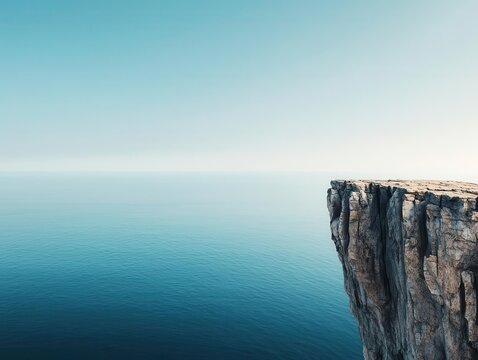 Towering seaside cliffs with endless blue sky, breathtaking view of the vast ocean horizon