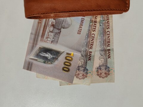 Currency notes, UAE Emirates currency 1000Aed, Dirhams, Closeup of UAE One Thousand dirhams currency notes, paper money 1000 Aed dirhams Dirhams banknotes, UAE Emirati Paper currency 1000 aed dirham