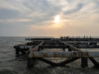 Fototapeta premium Rugged Unfinished Pier Foundation in Ocean.