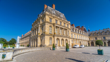 Obraz premium Beautiful Medieval landmark - royal hunting castle Fontainbleau timelapse hyperlapse.