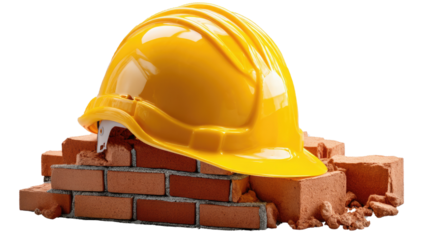 Construction Safety: A vibrant yellow safety helmet rests atop a meticulously arranged stack of brick, embodying the principles of workplace safety, construction, and industry.