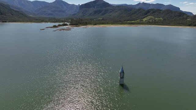Submerged church tower in Sideropolis, Nova Veneza, Santa Catarina. Flooded church. Aerial view.