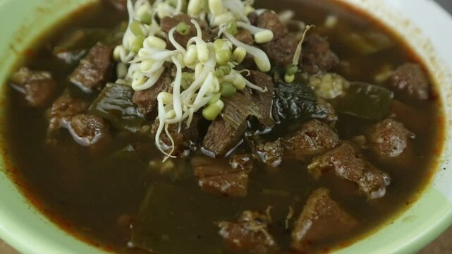nasi rawon, Indonesian black beef soup with rice. Javanese food