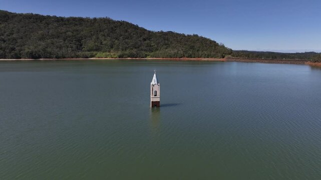 Submerged church tower in Sideropolis, Nova Veneza, Santa Catarina. Flooded church. Aerial view.