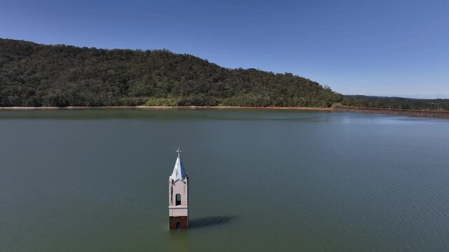 Submerged church tower in Sideropolis, Nova Veneza, Santa Catarina. Flooded church. Aerial view.