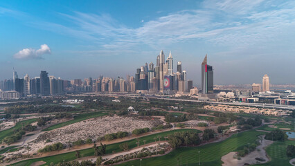 Dubai Marina skyscrapers and golf course morning timelapse, Dubai, United Arab Emirates