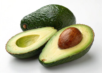 Ripe green avocado, a healthy tropical fruit, cut in half to reveal its seed, isolated on a wooden surface