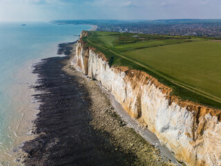 Aerial drone view over the famous, white cliffs of The Seven Sisters Dover, south England.