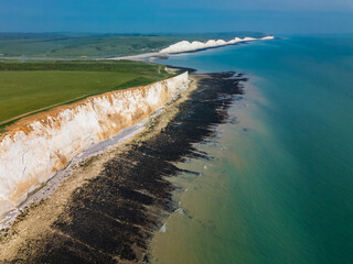 Aerial drone view over the famous, white cliffs of The Seven Sisters Dover, south England.