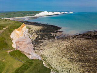 Aerial drone view over the famous, white cliffs of The Seven Sisters Dover, south England.
