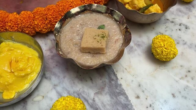 Bengali sweets like paes and misti Sandesh served in rice ceremony in Kolkata.