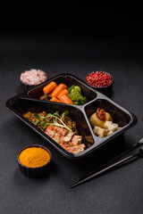 Food bowl with tofu, quinoa, broccoli and carrots, microgreens