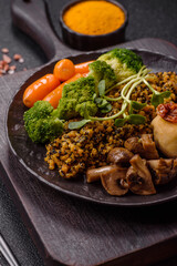 Food bowl with tofu, quinoa, broccoli and carrots, microgreens
