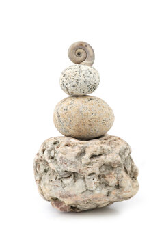 Stacking sea stones and shell isolated on white background. Heap of sea washed pebbles.