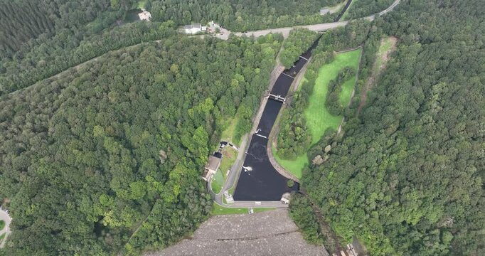 Lac de la Gileppe, lake in the ardennes, Belgium. Aerial view. Large dam, drinking water, lion statue. Aerial drone video.