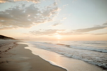 Obraz premium Sunrise over calm ocean waves on a sandy beach Generative AI