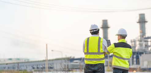 Group Asian man petrochemical engineer working at oil and gas refinery plant industry factory,The people worker man engineer work control at power plant energy industry manufacturing