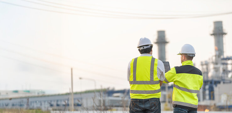 Group Asian man petrochemical engineer working at oil and gas refinery plant industry factory,The people worker man engineer work control at power plant energy industry manufacturing