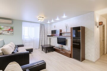 standard interior apartment. living room with sofa