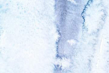 Elegant blue watercolor texture with abstract patterns and subtle gradients for creative designs.