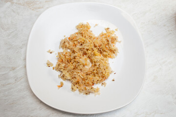 Pickled cabbage on a white ceramic plate soft focus flat lay close up
