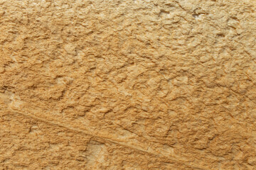 Orange  polyurethane foam harden structure abstract textured backdrop, close up