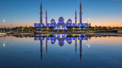 Sheikh Zayed Grand Mosque in Abu Dhabi day to night timelapse after sunset, UAE