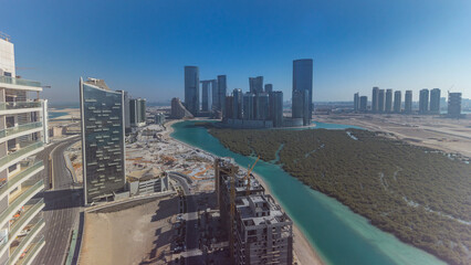 Buildings on Al Reem island in Abu Dhabi timelapse from above.