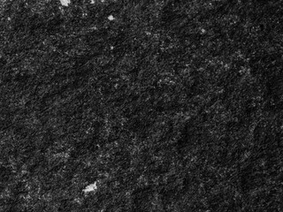 spots of black ink on white paper