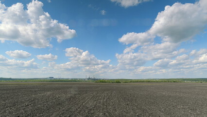 A Stunningly Beautiful and Panoramic Sky Spreading Across Vast Agricultural Land and Fields