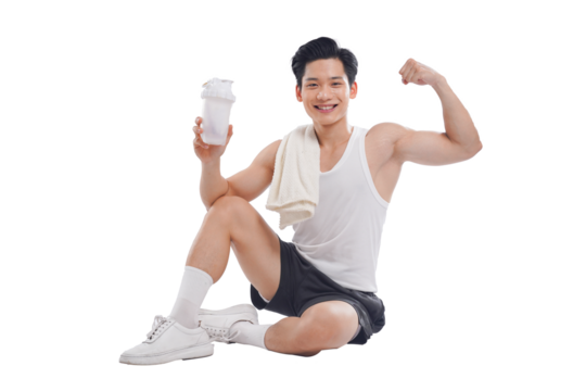 Portrait of muscular Asian man in sportswear sitting posing on white background