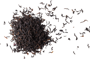 A close-up view of loose black tea leaves scattered on a white background. showcasing their texture and color. ideal for culinary or beverage-related content