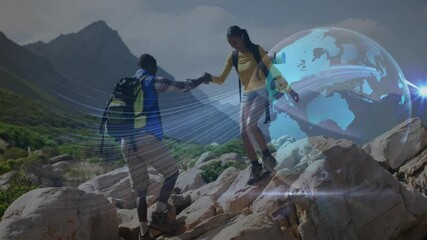 Hiking partners helping woman climb rocky trail, integrating technology globe and network lines