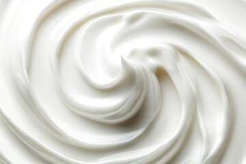 A close-up view of a smooth. creamy swirl of white substance. resembling whipped cream or lotion. showcasing its glossy texture and soft peaks. ideal for culinary or cosmetic use