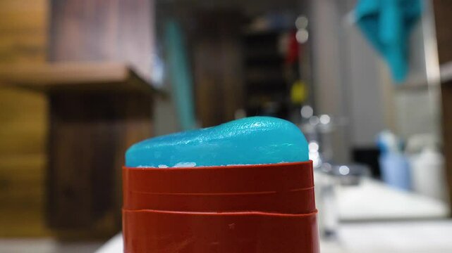 Deodorant against sweat on a turntable, close-up, deodorant against sweat from unpleasant odors under the human armpits