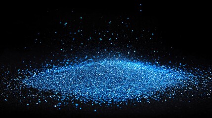 A vibrant, concentrated blue glitter explosion on a dark surface.