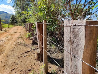Wooden fence on a country road