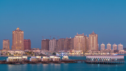 Fototapeta premium View from Katara Beach day to night timelapse in Doha, Qatar, towards the Pearl